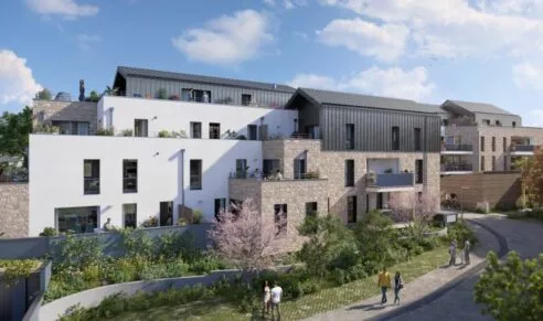 Extérieur de la résidence Le Garry à Châteaubourg, situé près de Rennes. Jardin partagé et façade du bâtiment. Des logements neufs réalisés par Pierre Promotion.