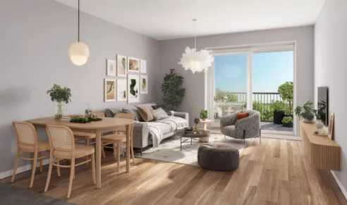 Salon et salle à manger d'un appartement de la résidence Le Flow, situé à Rennes. Ouvert sur un balcon extérieur. Des logements neufs réalisés par Pierre Promotion.