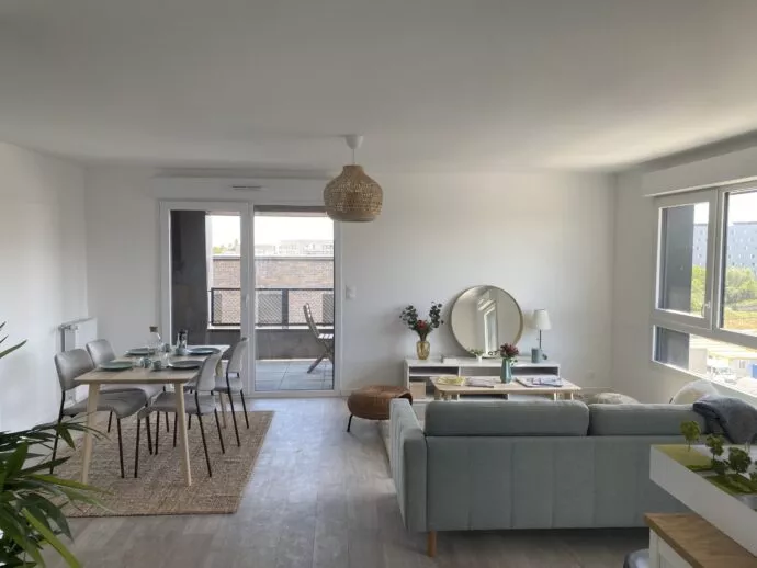 Salon et salle à manger des appartements neufs de la résidence immobilière Brownstone à Saint-Jacques-de-la-Lande, aux portes de Rennes.