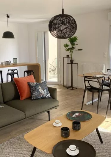 Salon et salle à manger des appartements neufs de la résidence immobilière Brownstone à Saint-Jacques-de-la-Lande, aux portes de Rennes.