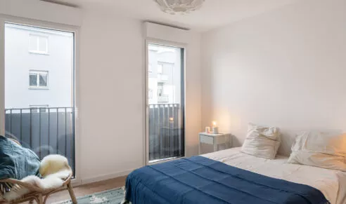 Résidence Agapanthe à Lorient, appartement témoin lumineux, photo de la chambre avec lit double.