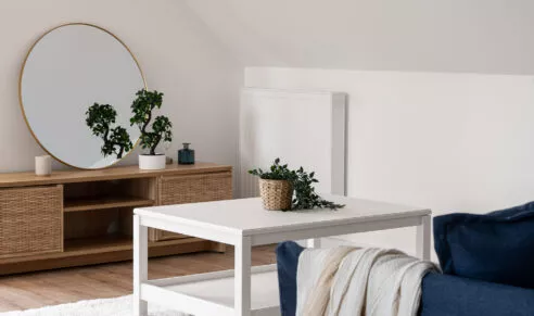 Résidence Agapanthe à Lorient, appartement témoin lumineux, photo du salon, zoom sur le canapé.
