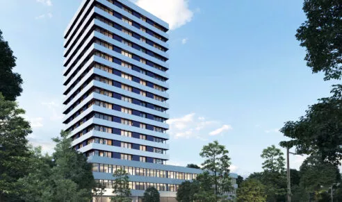 Extérieur du bâtiment Perspectives situé à Saint-Jacques-de-la-Lande, près de Rennes. Un ensemble de logements et de cellules commerciales réalisé par Pierre Promotion.