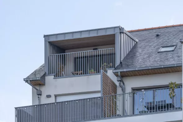 Photo extérieure de la résidence Expression à Montfort-sur-Meu, proche de Rennes. Des appartements avec balcon ou loggia.