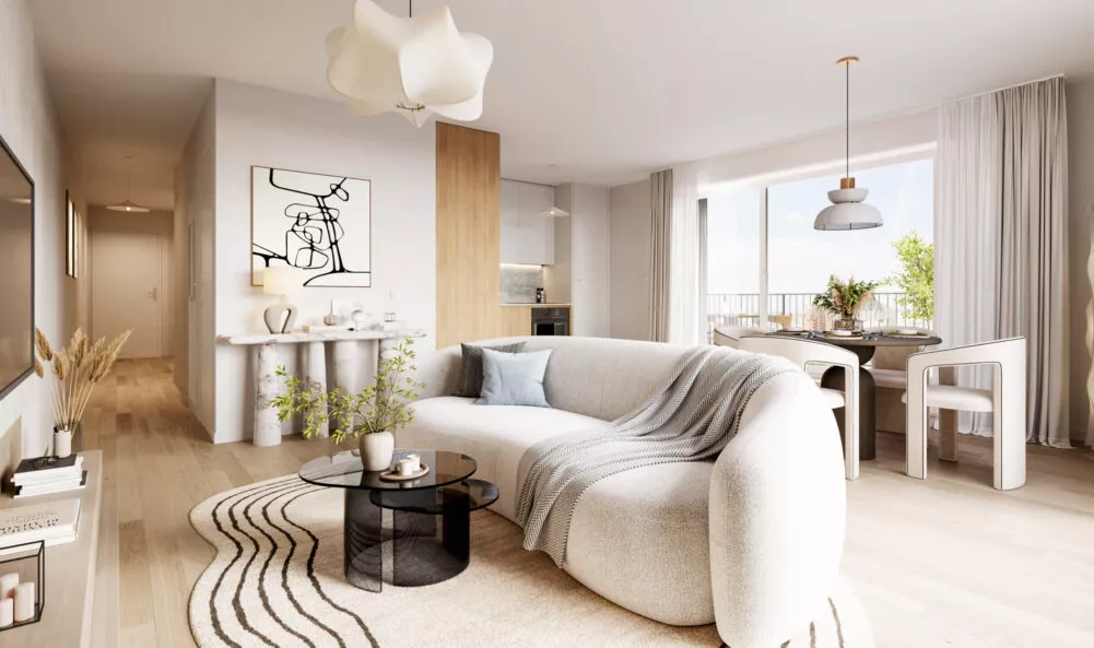 Intérieur d'un appartement de la résidence Maïa au Rheu, vue sur le salon, la salle à manger et la cuisine. Un programme immobilier neuf réalisé par Pierre Promotion.