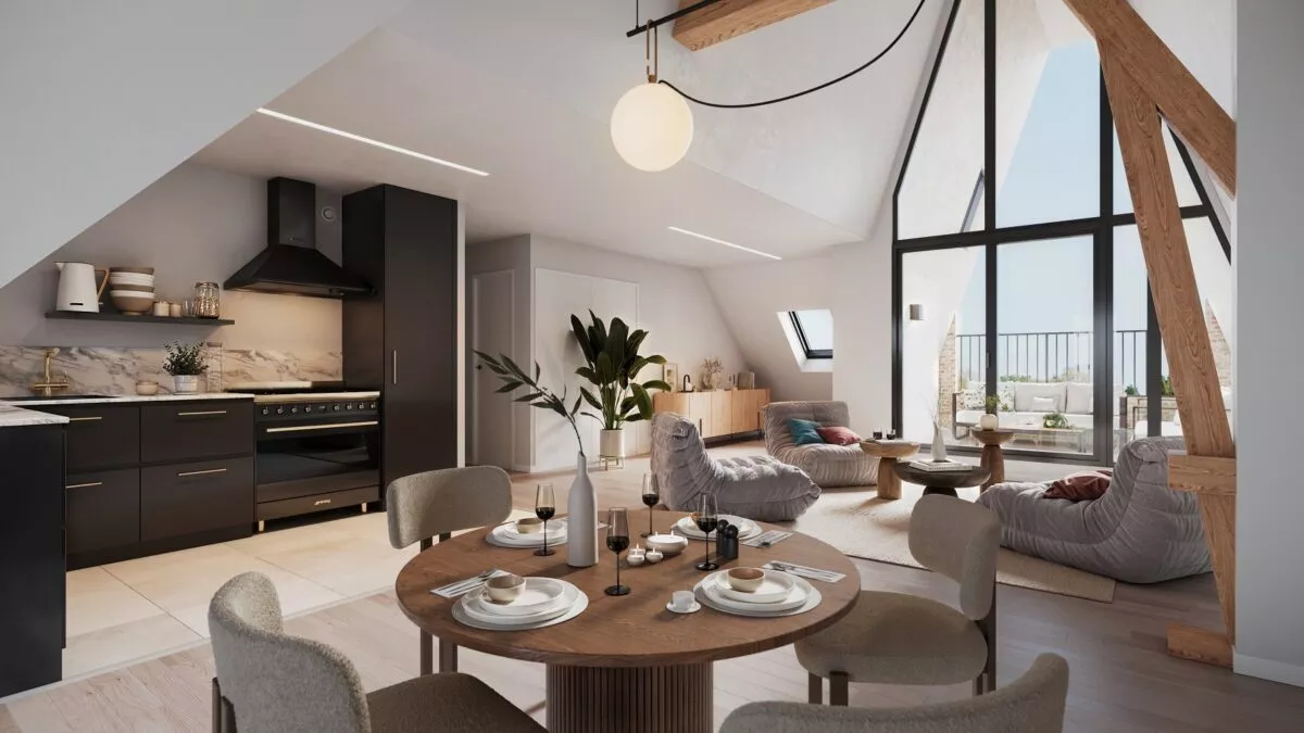 Intérieur d'un appartement de la résidence George V à Saint-Malo, cuisine, salon et salle à manger. Des appartements réalisés par Pierre Promotion.