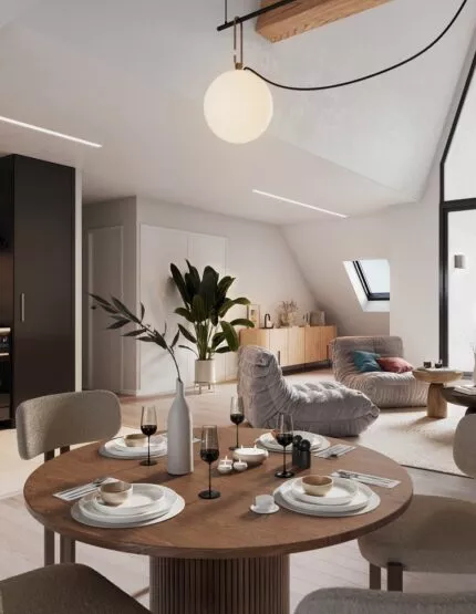 Intérieur d'un appartement de la résidence George V à Saint-Malo, cuisine, salon et salle à manger. Des appartements réalisés par Pierre Promotion.