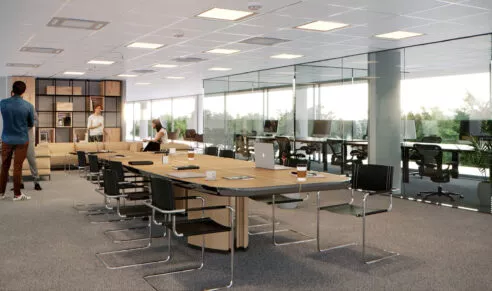 Dans les bureaux du programme Miles, une grande salle de réunion vitrée.